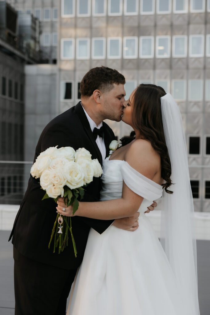 Bride and groom on a rooftop in downtown Dallas