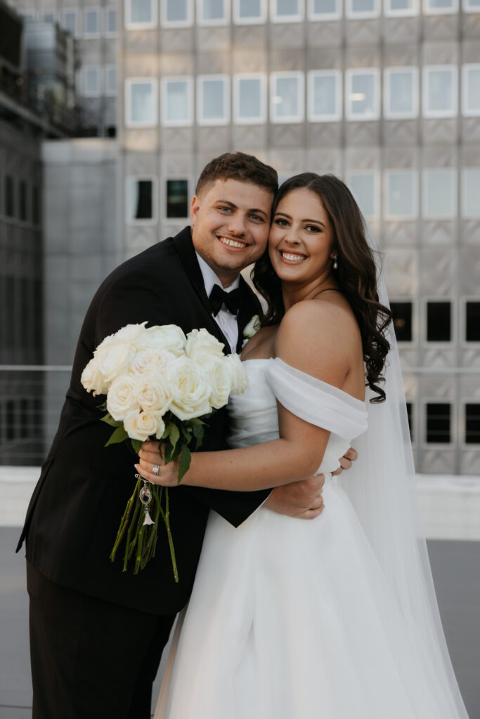 Bride and groom on a rooftop in downtown Dallas