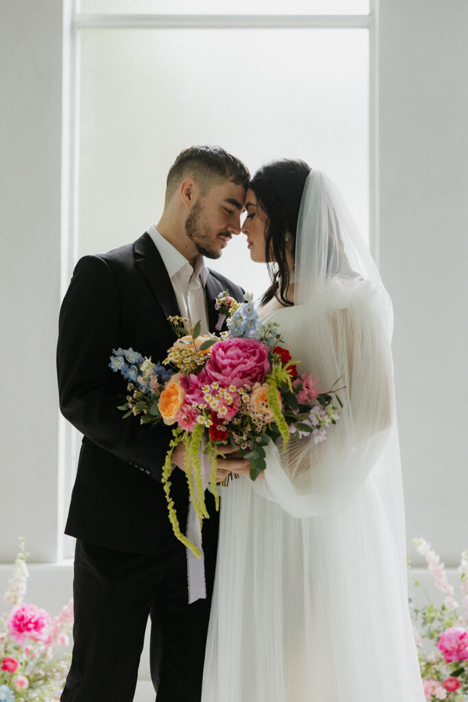 bride and groom portraits under the veil
