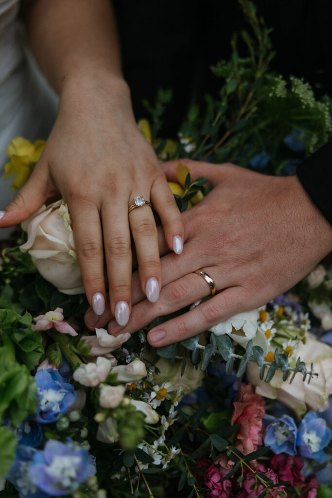 colorful wedding flowers and rings