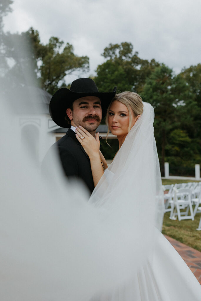 bride and groom portraits with veil