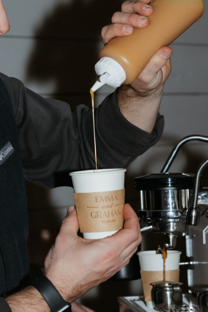 Vendor making coffee for guests.