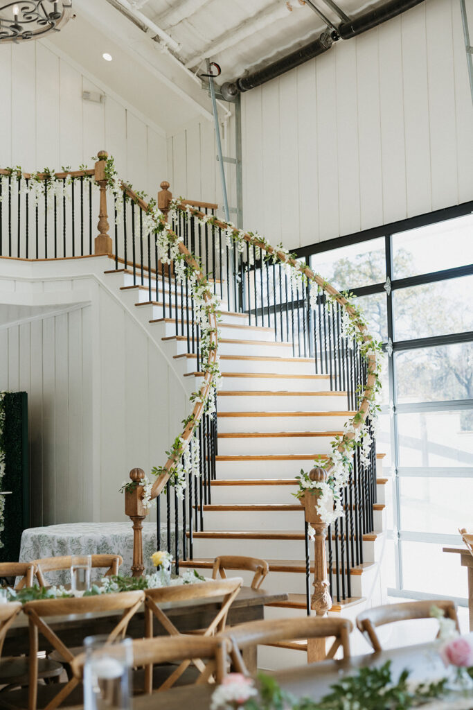 Decorated staircase at a DFW wedding venue. 