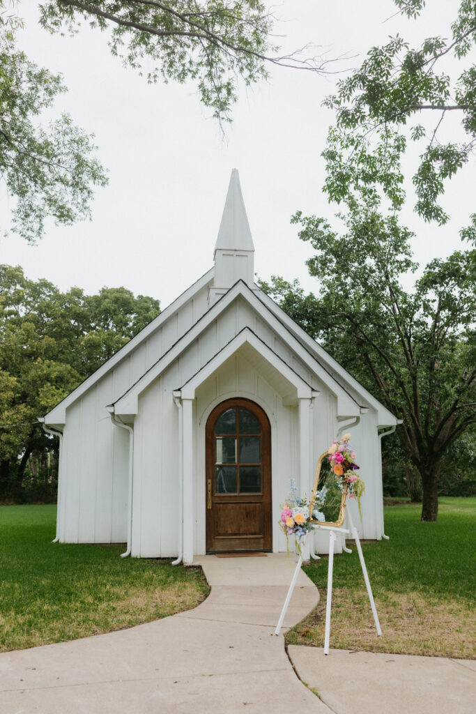 A white chapel at The Emerson Venue, one of the best DFW wedding venues for summer weddings.