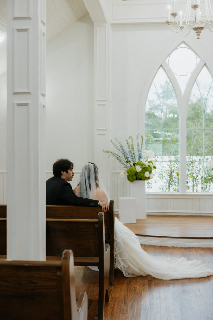 Bride and groom sitting during their summer wedding in DFW.