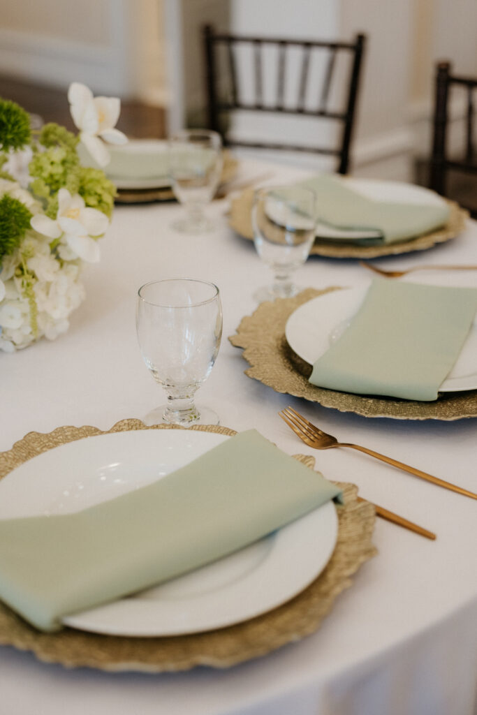 Gold and green tablescape at the reception at The Springs Valley View Estate.
