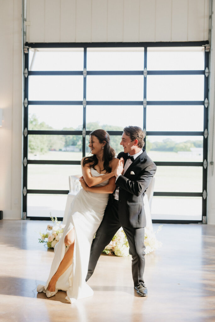 Bride and groom having their first dance at their wedding reception.