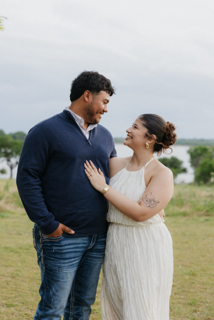 Couple smiling together after their proposal at Winfrey Point.