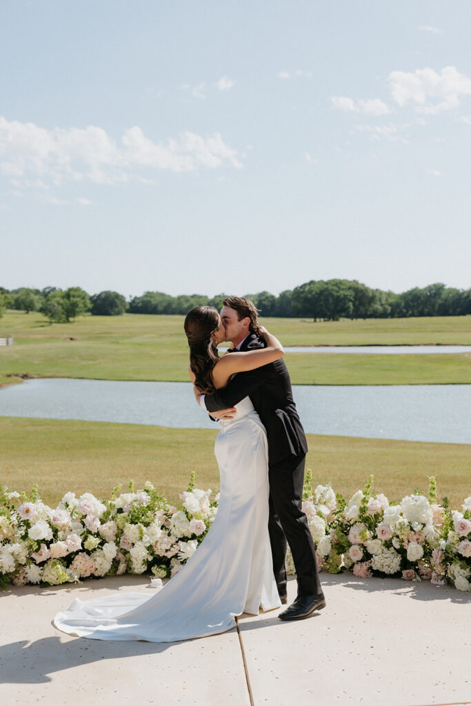 Spring wedding ceremony at Bella Cavalli Events in Aubrey, Texas.