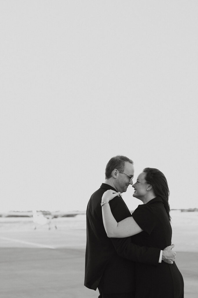 Couple about to kiss during engagement photos.