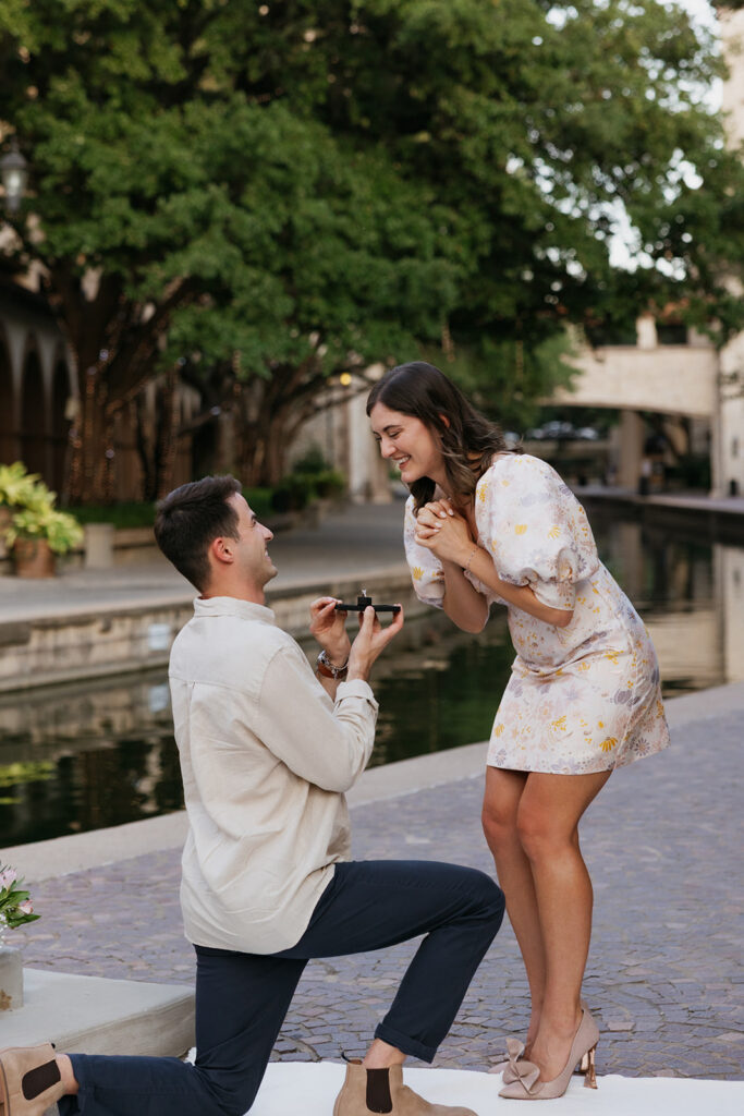 Woman smiling as she gets proposed to at Mandalay Canal Walk.