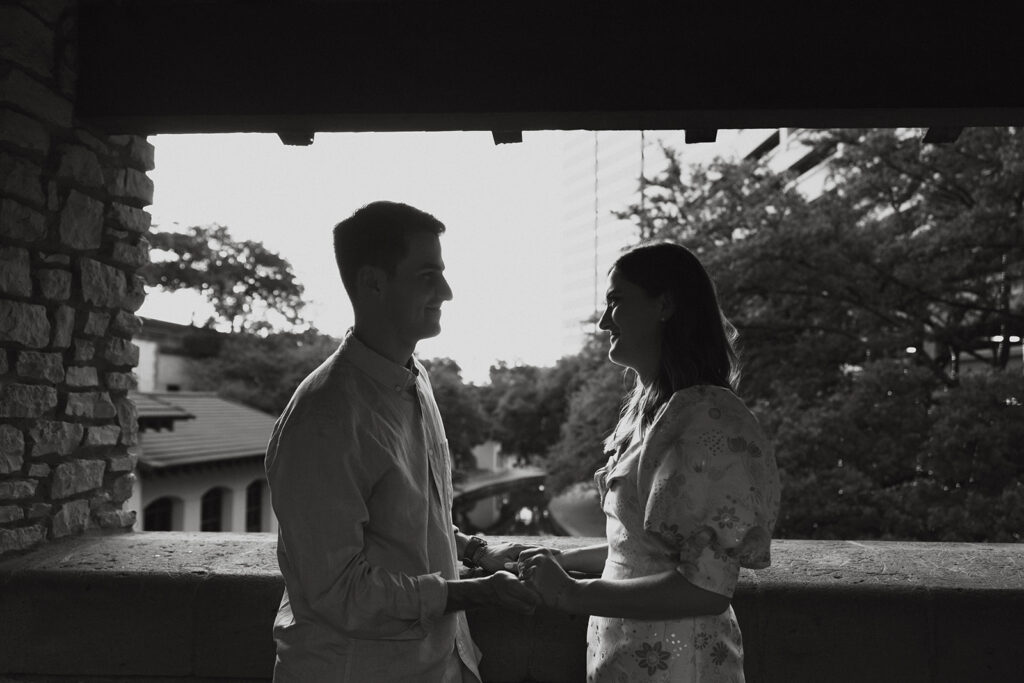 Man and woman looking at one another romantically.